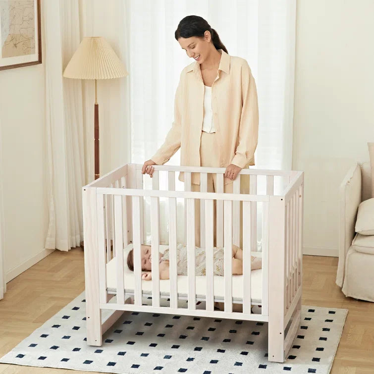 6-in-1 Portable Convertible Mini Crib With Mattress & Removable Wheels, 100% New Zealand Wood Growing Bed, Washed Natural
